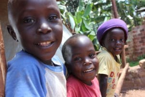 Climate Action brings smiles to school children On the playground of a school with solar.