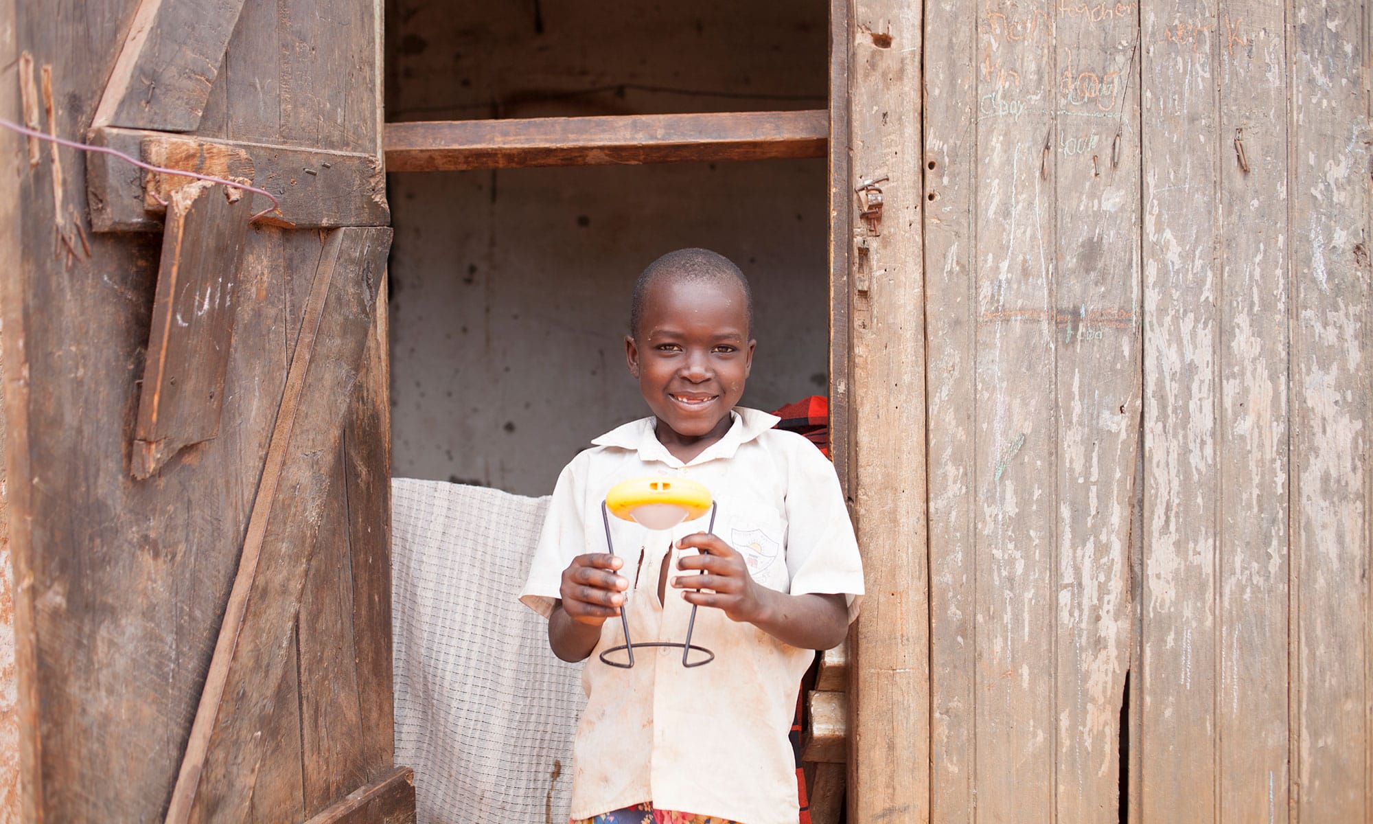 young boy with solar light